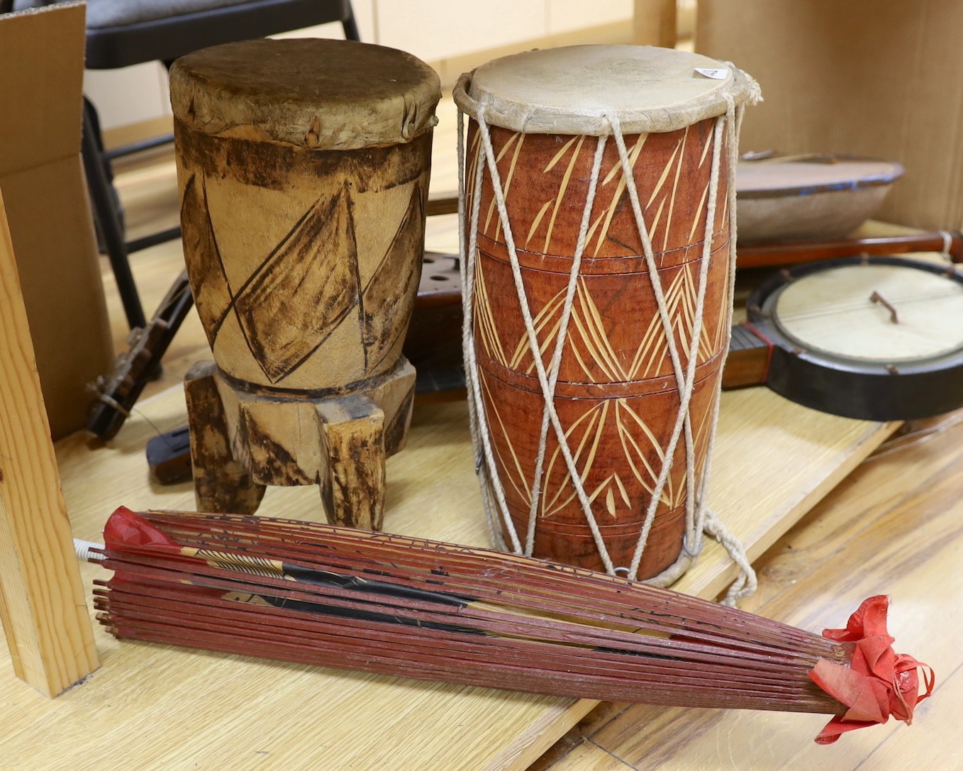 Two African drums and a parasol